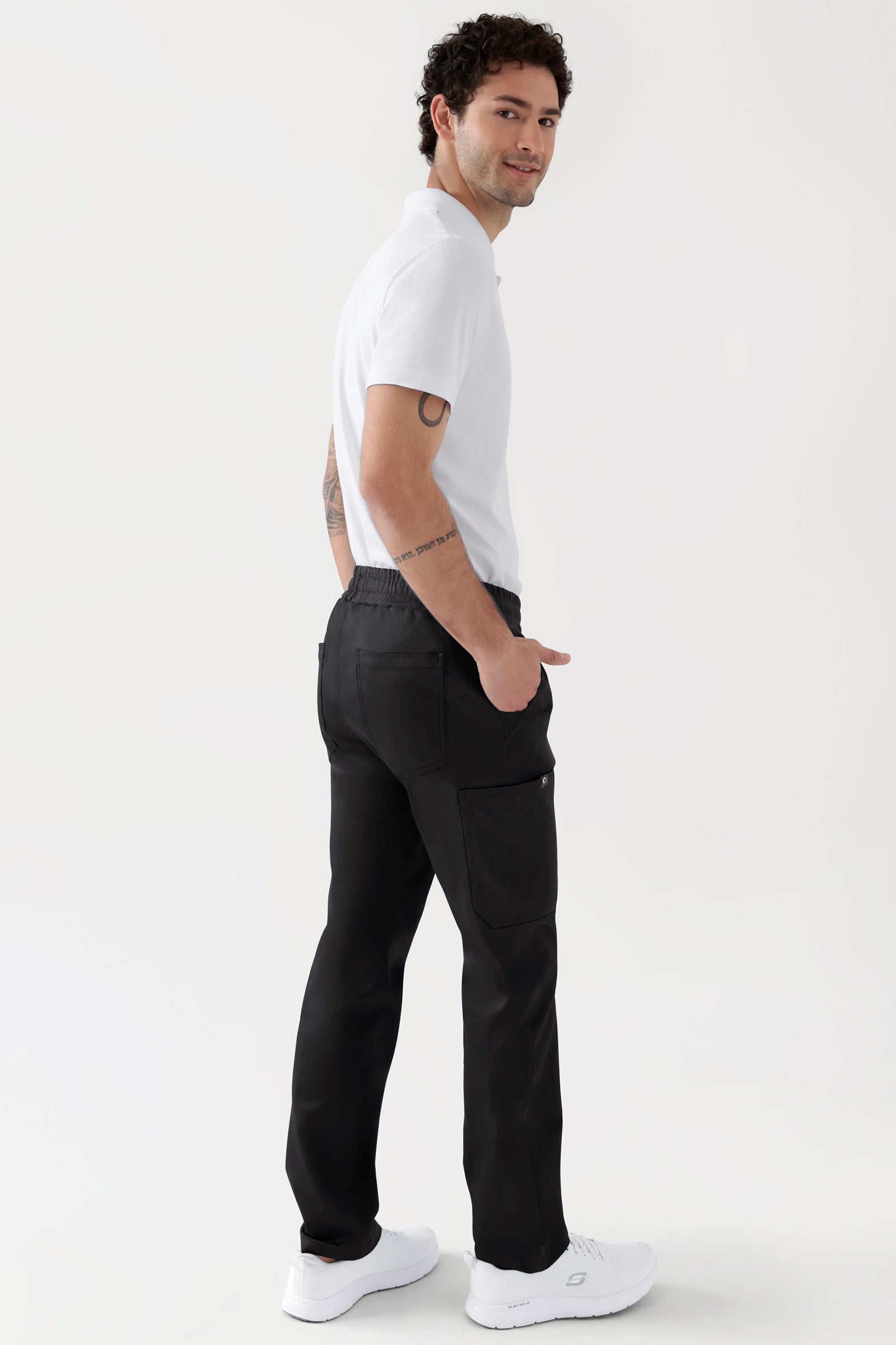 COMFY FLEX Stretch Hose Unisex - 1/1 Länge schwarz, Rückansicht Das Model ist 188 cm gross und trägt Grösse M