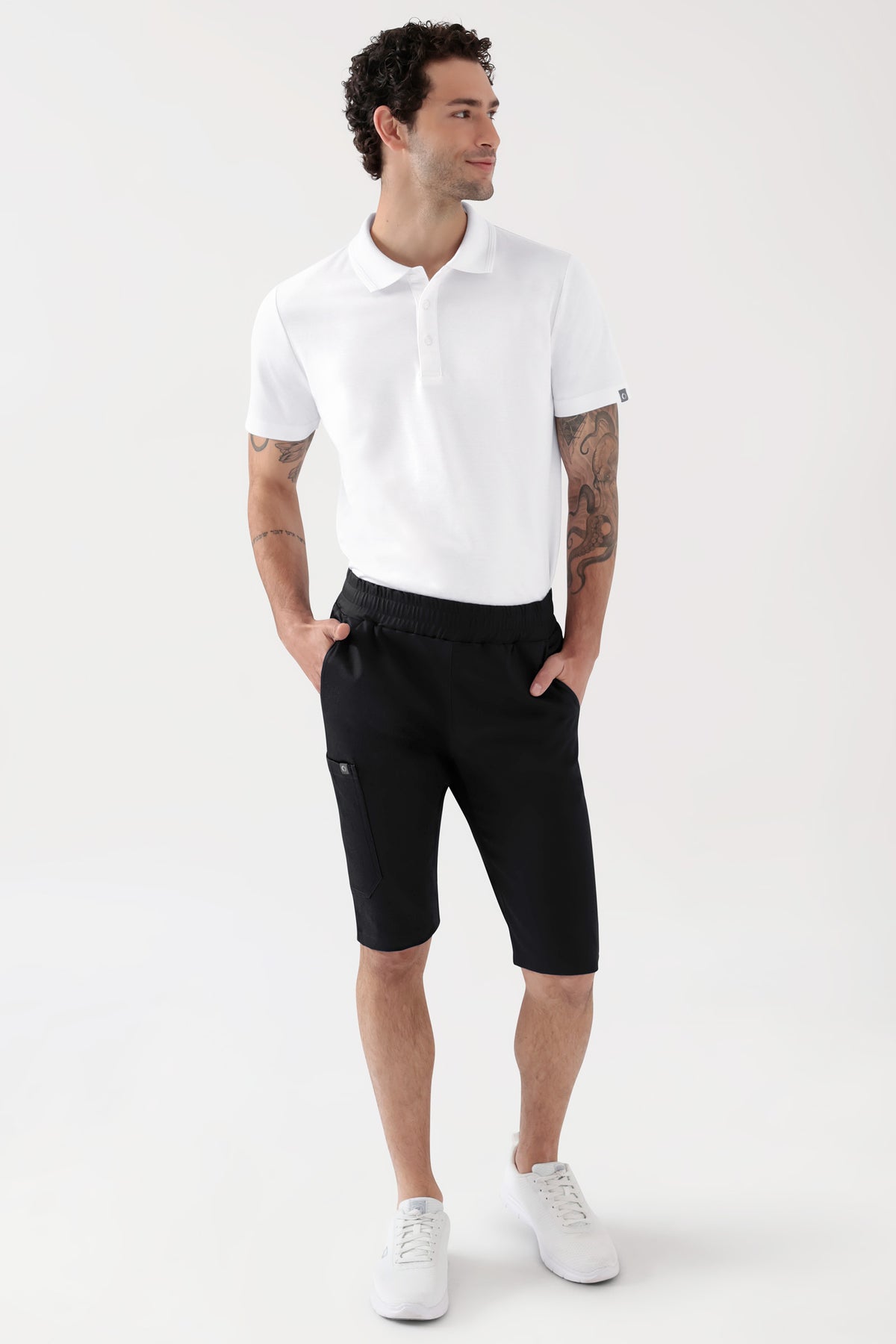 COMFY FLEX Stretch Hose Unisex - Bermuda schwarz, Vue de face Le mannequin mesure 188 cm et porte la taille M