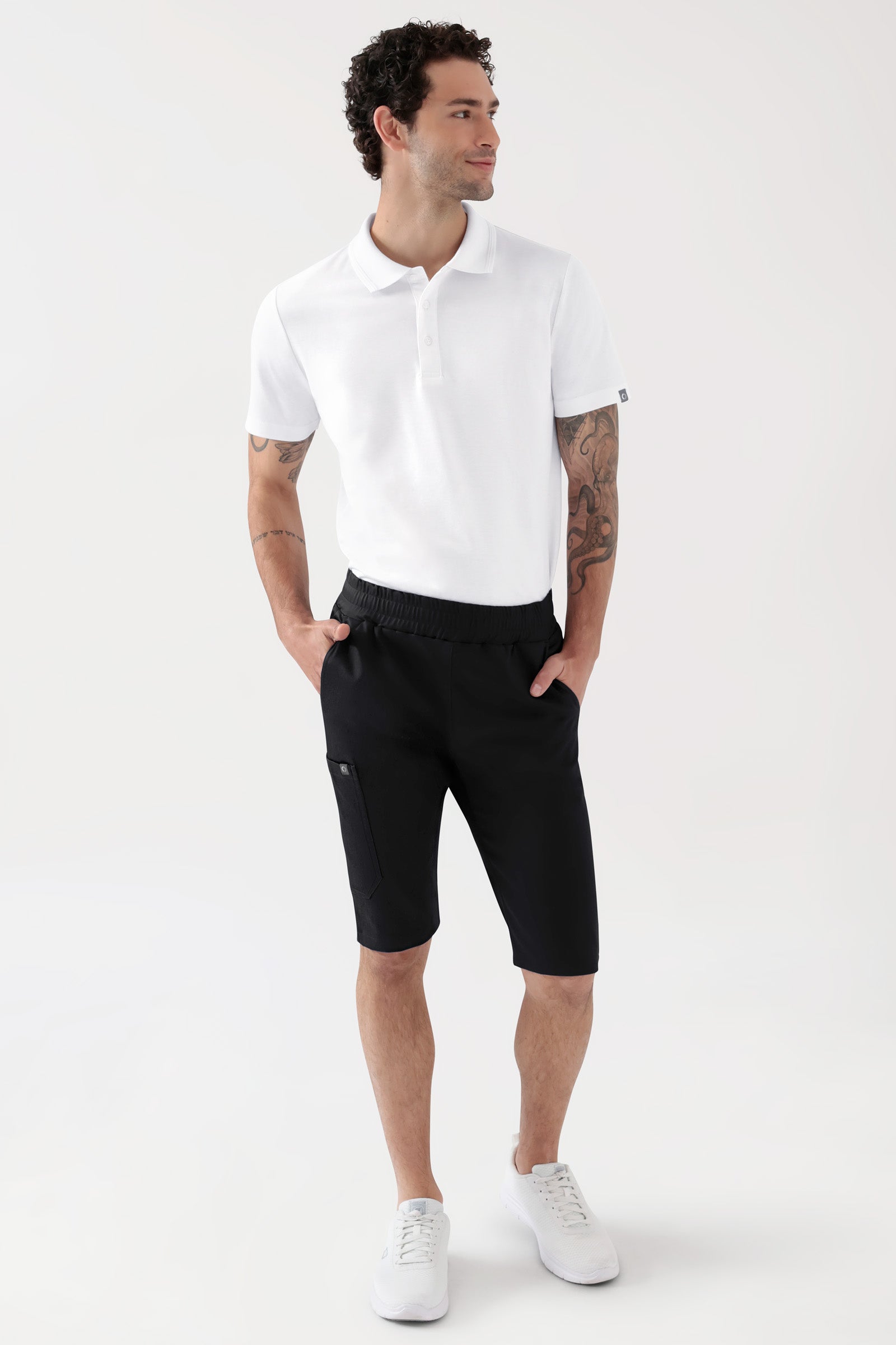 COMFY FLEX Stretch Hose Unisex - Bermuda schwarz, Vorderansicht Das Model ist 188 cm gross und trägt Grösse M